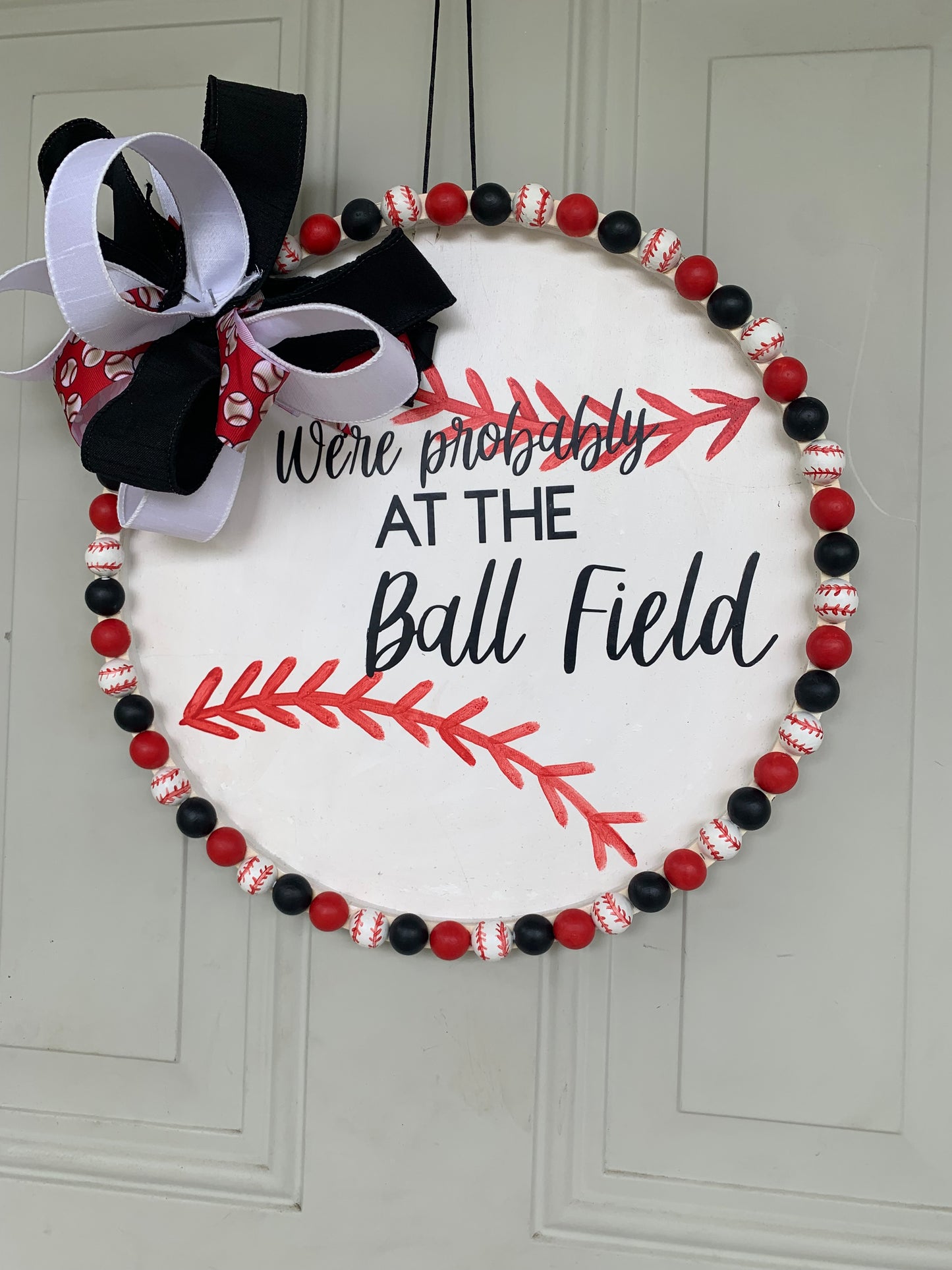 Ball field door hanger